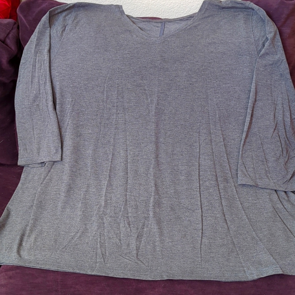 A Fall top with three quarter length sleeves